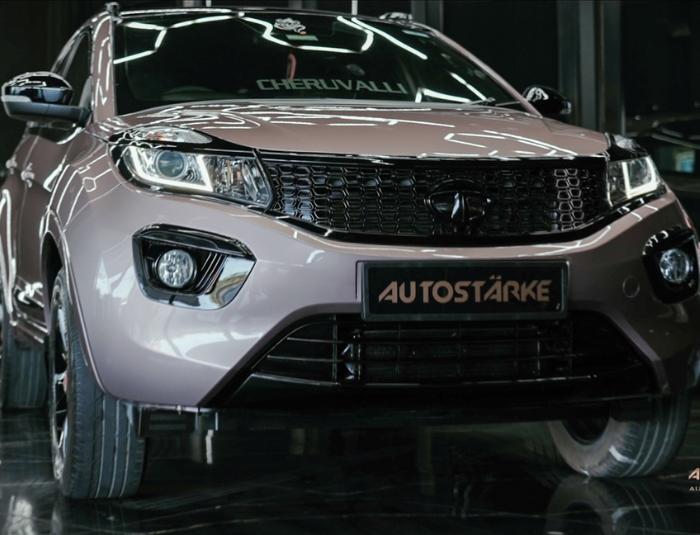 Custom rose gold glossy car painting by Autostarke Kerala