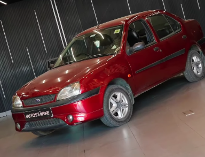Ford Ikon repainting and paint work by Autostarke Kerala